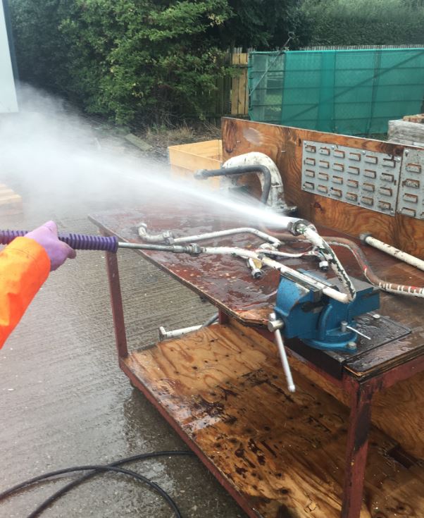 High Pressure Water Jet Cleaning of an Industrial Pipe with a combination of bends High Pressure Water Jet Cleaning of an Industrial Pipe with a combination of bends