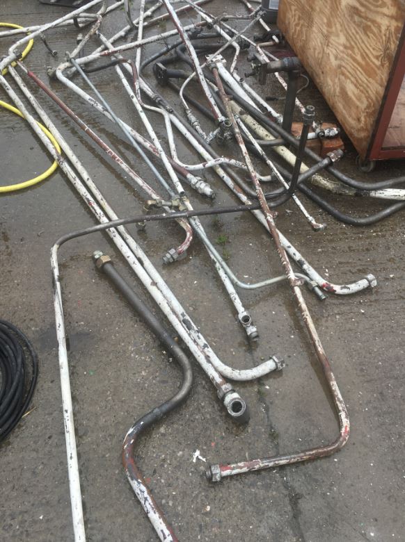 Industrial Hydraulic Pipes of different lengths and diameters all requiring cleaning Industrial Hydraulic Pipes of different lengths and diameters all requiring cleaning