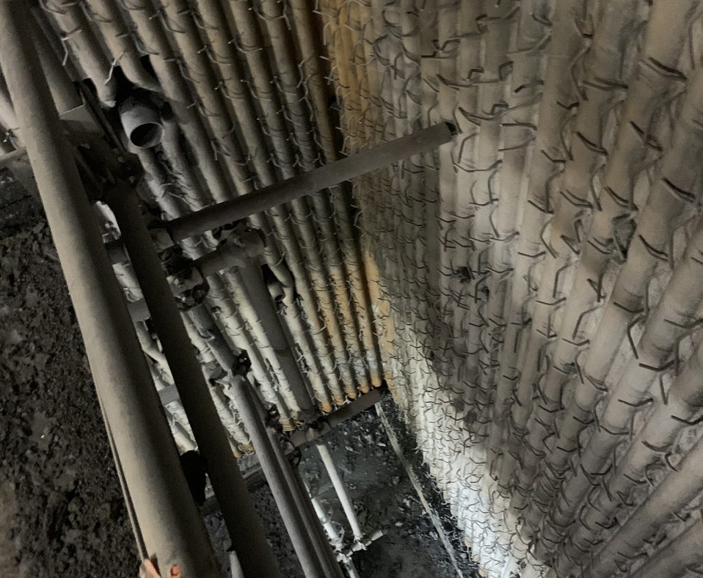 Refractory finish after jetted